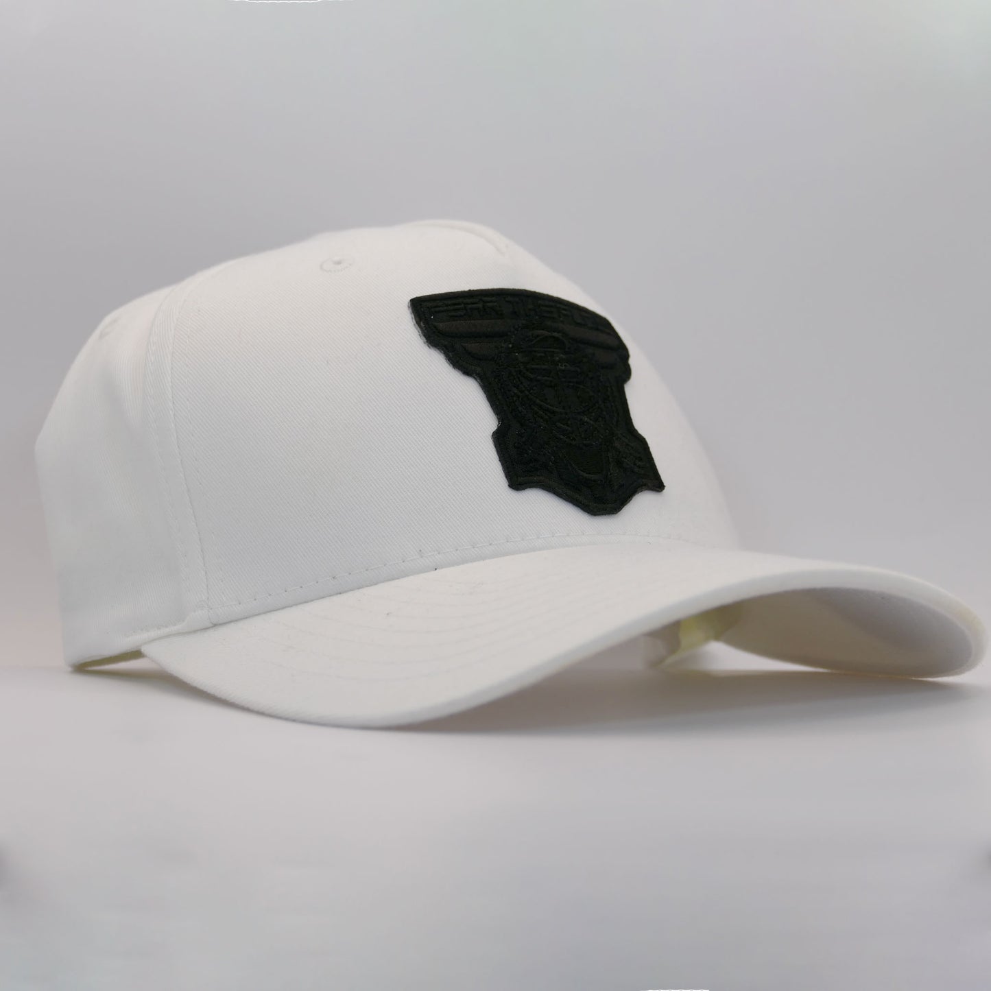 White FlexFit Hat with Black Patch